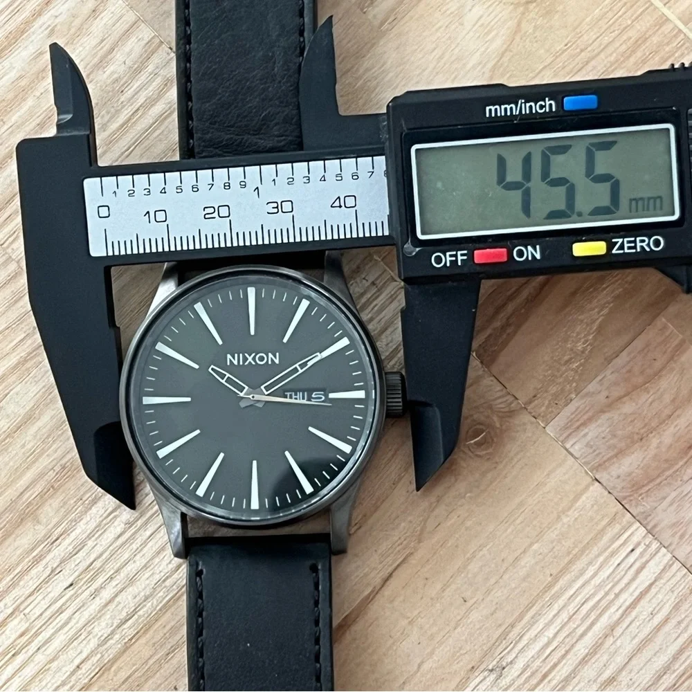Nixon The Sentry Never Be Late Watch Black Green Dial Gunmetal Case Leather